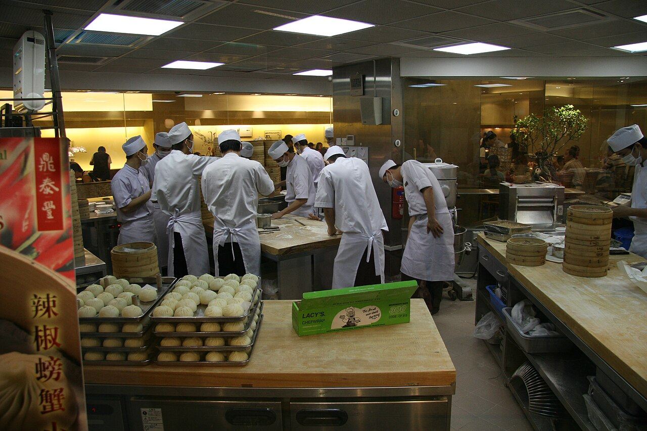 Food service worker using a digital tool
